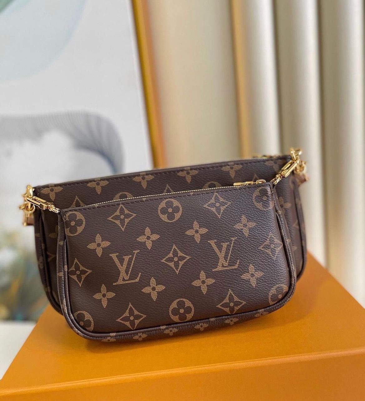 LV MULTI POCHETTE ACCESSOIRES